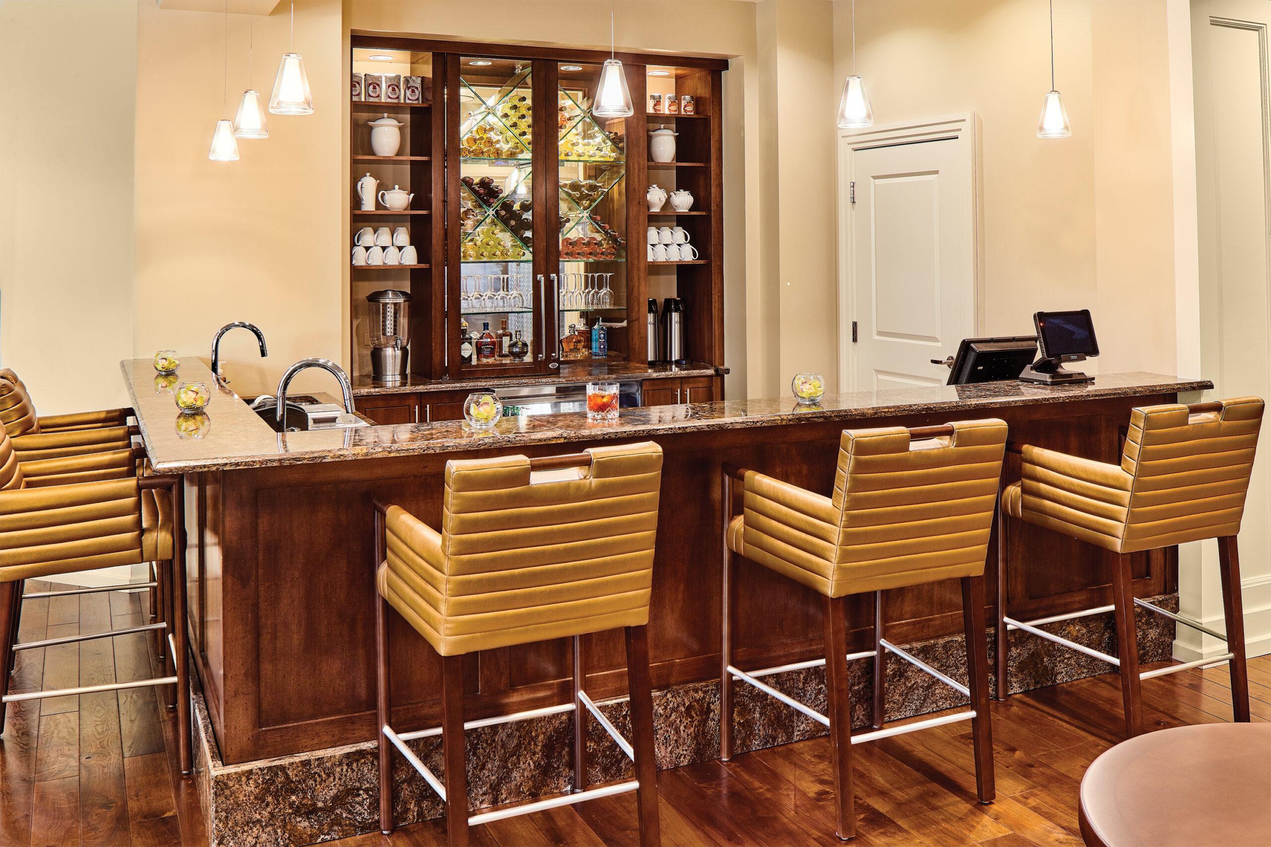 Modern Wood-Paneled Pub And Granite Bar At Modena Green Oaks.